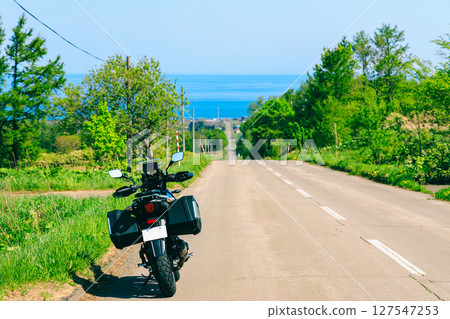Roads and bikes leading to the Sea of Okhotsk in Hokkaido Roads and bikes leading to the Sea of Okhotsk in Hokkaido 127547253