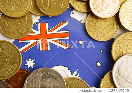 Australia flag on coin and banknote money, finance trading investment business currency concept. 127547649