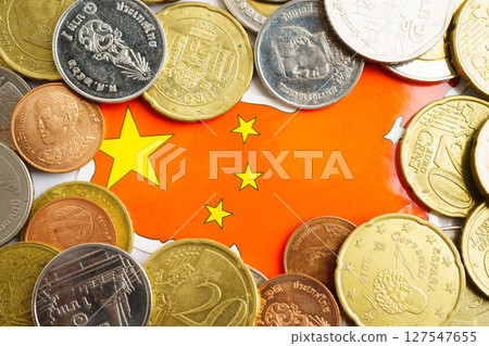 China flag on coins background, finance and accounting, banking concept. China flag on coins background, finance and accounting, banking concept. 127547655