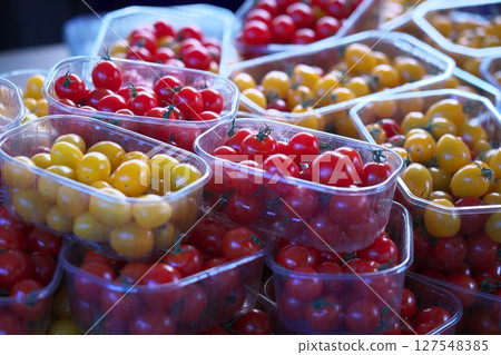 Colorful tomatoes for sale at a market in Paris Colorful tomatoes for sale at a market in Paris 127548385