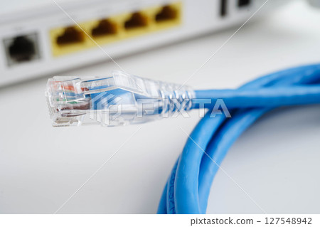 Ethernet cable with wireless router connect to internet service provider network. 127548942