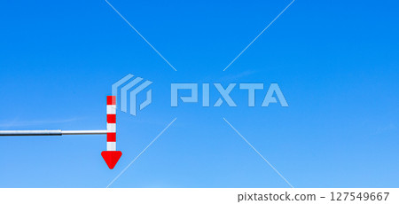 A simple landscape with blue sky and arrows 127549667