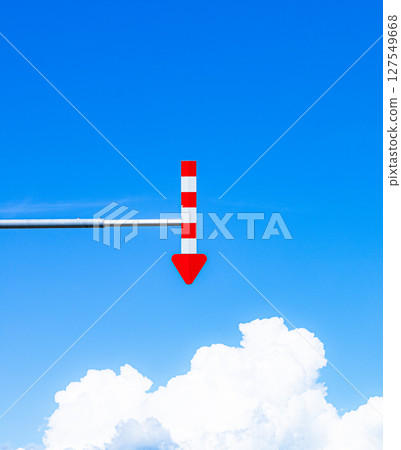 A simple landscape with blue sky, clouds and arrows 127549668