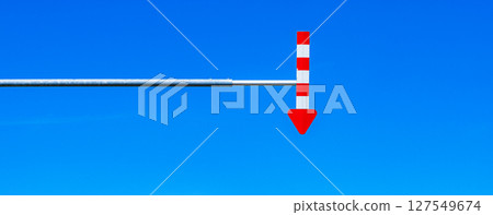 A simple landscape with blue sky and arrows A simple landscape with blue sky and arrows 127549674