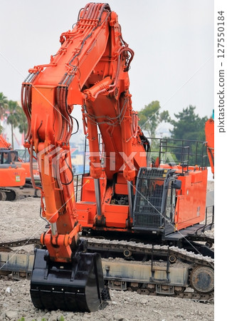 Construction site hydraulic excavator 127550184