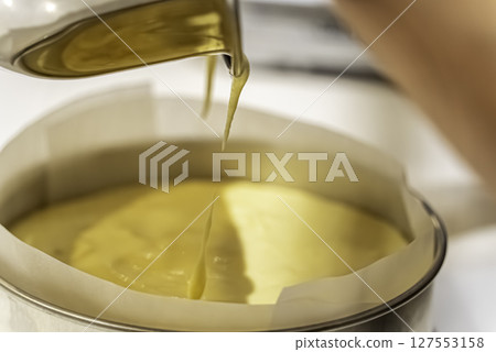 Sponge cake making Sponge cake making 127553158