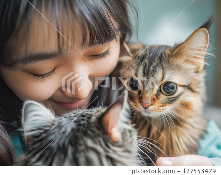 A Girl Creates Joyful Memories Playing With Pets 127553479