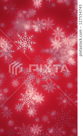 Festive red background with delicate white snowflakes falling in soft focus 127554743