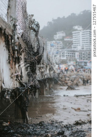 Construction is ongoing to repair the road after it was damaged in a landslide 127555467