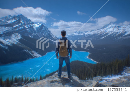 At Peyto Lake, a tourist who enjoys hiking is found in Banff National Park, Alberta, Canada 127555541