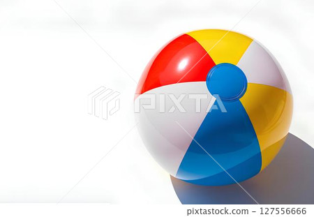 Bright inflatable beach ball mockup isolated on white background, for summer-themed branding and playful promotional graphics. 127556666
