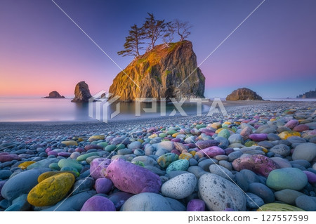 The Pacific coast at Rialto beach near La Push in Olympic National Park, Washington, USA, is where the sunset occurs 127557599