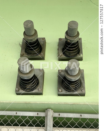 Close-up of the four plungers 127557817
