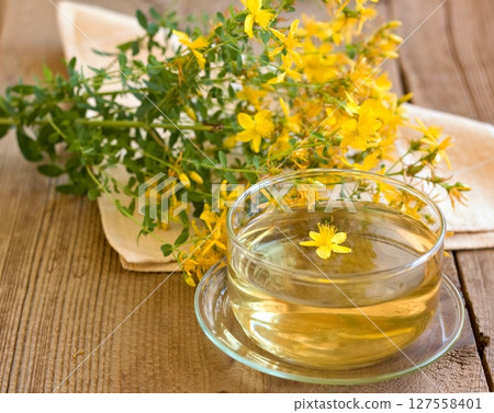 Herbal tea from Hypericum perforatum commonly known as St John's wort. Herbal tea from Hypericum perforatum commonly known as St John's wort. 127558401