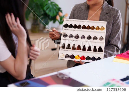 Personal Color Consultation for Asian Women Choosing Hair Dye Color at Salon Adult Model Demonstrates Swatches Best Tones Palette 127558606