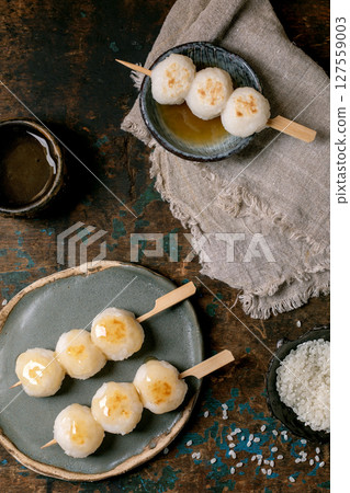 Japanese Dango Dumplings on Wooden Table 127559003
