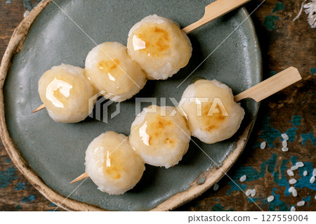 Japanese Sweet Dumplings on Wooden Skewers 127559004