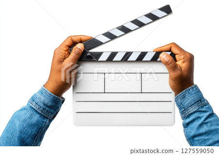 Movie Clapperboard in Hands on White Background 127559050