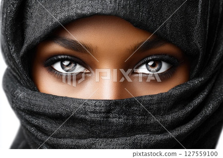 Beautiful Eyes of Woman Wearing Shimmering Hijab 127559100