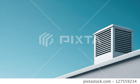 Single Rooftop Vent Against Clear Blue Sky 127559234