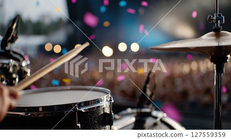 Close-Up of Drum Performance at Outdoor Concert 127559359