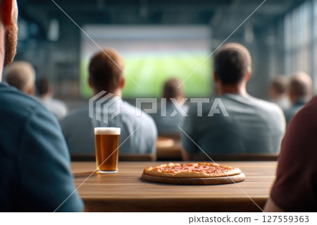 Group of Friends Watching a Soccer Game with Pizza and Beer 127559363