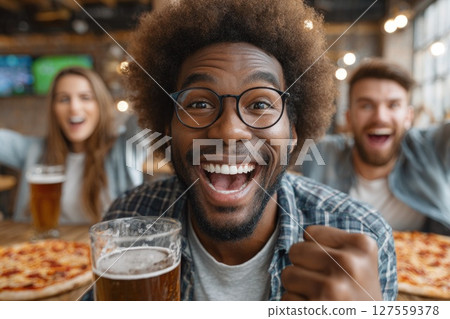 Excited Fan Celebrating a Victory Excited Fan Celebrating a Victory 127559378