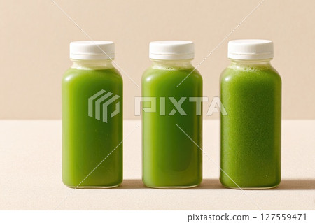 Trio of Green Juice Bottles for Detox or Healthy Living Trio of Green Juice Bottles for Detox or Healthy Living 127559471
