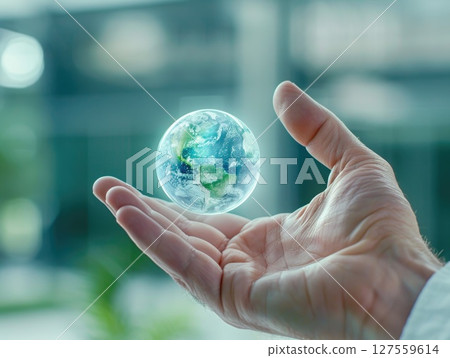 Realistic Earth Globe Floating Above Hand Realistic Earth Globe Floating Above Hand 127559614