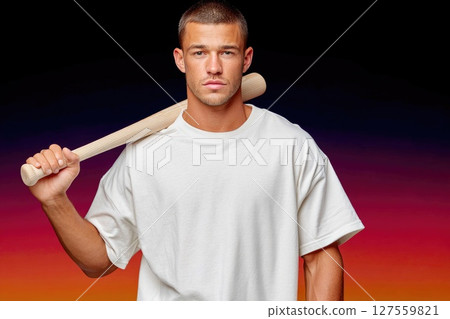 Focused Baseball Player in White Shirt with Bat on Shoulder 127559821