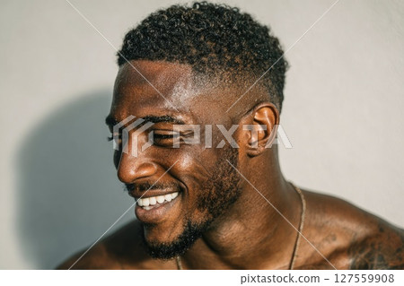 Fit Man Smiling After Workout 127559908