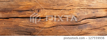Weathered Wooden Surface with Knots and Grain 127559936