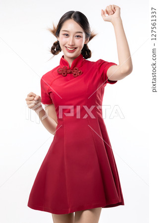 Portrait of joyful beauty Asian woman in red Cheongsam Chinese traditional dress isolated on white background. 127561337