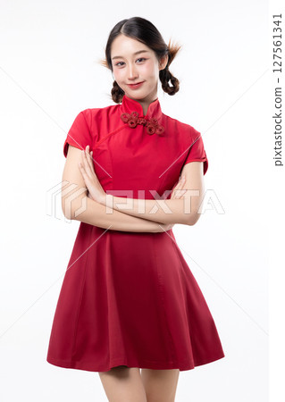 Portrait of joyful beauty Asian woman in red Cheongsam Chinese traditional dress isolated on white background. Portrait of joyful beauty Asian woman in red Cheongsam Chinese traditional dress isolated on white background. 127561341