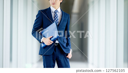 Young businessman in a suit Young businessman in a suit 127562105
