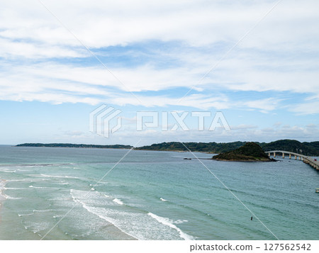 Beautiful white sandy coastline with Tsunoshima Bridge 127562542