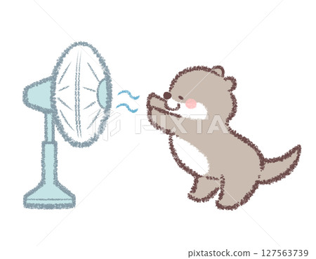 Asian small-clawed otter cooling off with a fan 127563739