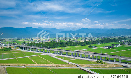 The Hokuriku Shinkansen viaduct in the Shimoyama area of Nyuzen Town, Toyama Prefecture, during the rainy season The Hokuriku Shinkansen viaduct in the Shimoyama area of Nyuzen Town, Toyama Prefecture, during the rainy season 127564766