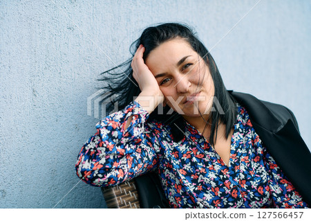 Confident Black Businesswoman Taking a Break on Terrace of Her Company Confident Black Businesswoman Taking a Break on Terrace of Her Company 127566457