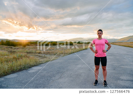 Athlete Stretching at Sunset After Intense Run Athlete Stretching at Sunset After Intense Run 127566476