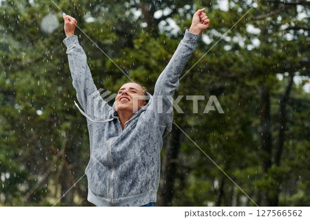 Beautiful Woman Enjoying Rainy Day After Intense Run Beautiful Woman Enjoying Rainy Day After Intense Run 127566562