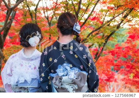 Japanese friends in kimono view autumn color, Kiyomizudera, Kyoto 127566967