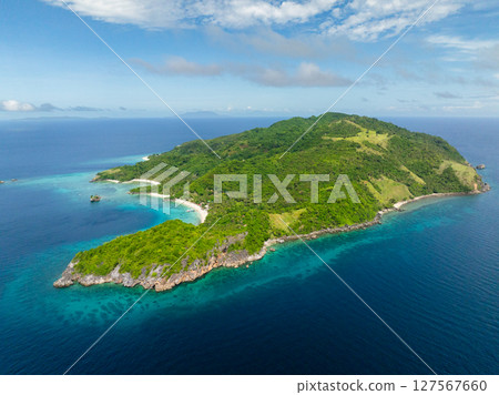 Cobrador Island with beach surrounded by coral reefs. Romblon, Philippines. 127567660
