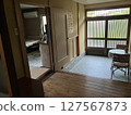 The entrance of a quaint old house 127567873