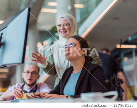 In a modern startup office, a diverse group of young professionals collaboratively tackles various business problems and challenges, surrounded by their engaged colleagues, fostering innovation and 127568153