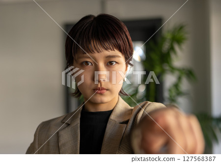 A woman pointed out A woman pointed out 127568387