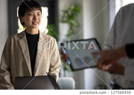 Woman having a meeting Woman having a meeting 127568430