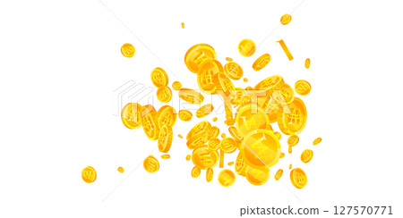 Korean won coins falling. Scattered gold WON 127570771