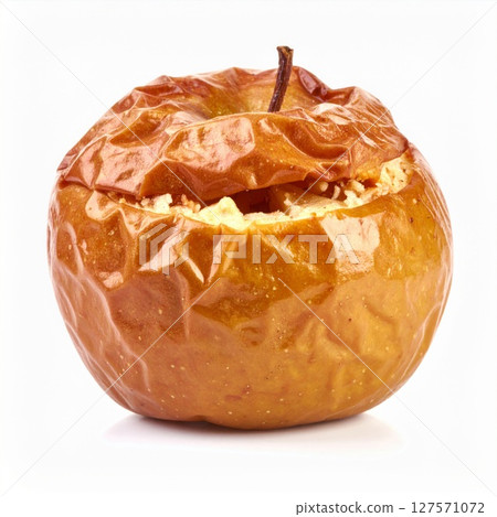Baked Apple with Golden Brown Skin on White Background 127571072