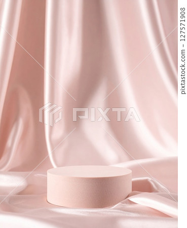 Pink Satin Fabric Drape with Cylindrical Display Platform 127571908